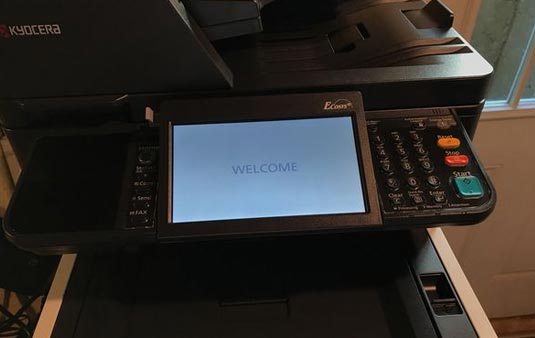 $15,000 for a Kyocera Copier, app only, corp only